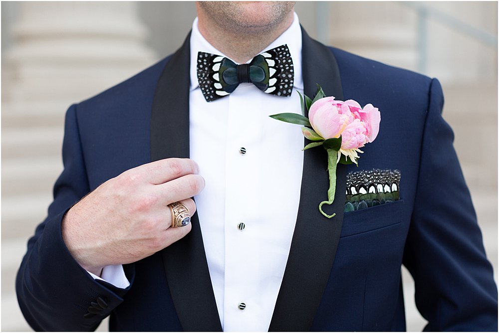 Close up of bow tie, pocket square, and peony boutonniere during stress free wedding day