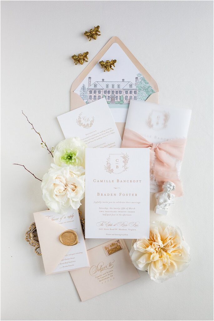 Flat lay invitation suite for whimsical spring wedding editorial