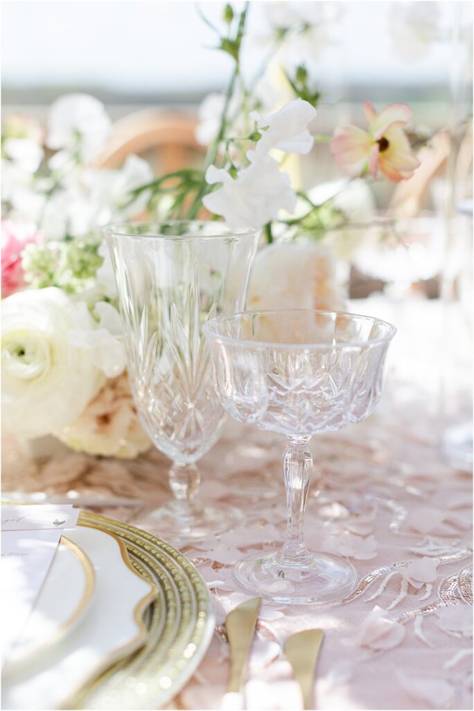 Glassware on tablescape for whimsical styled wedding editorial with cherry blossoms