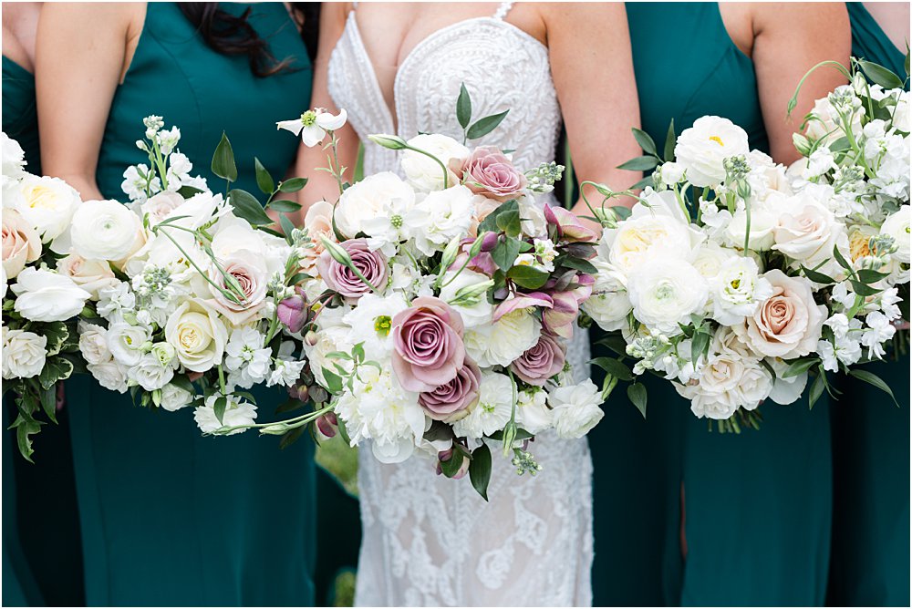 close up of modern romantic wedding bouquets in shades of blush, mauve, and white.