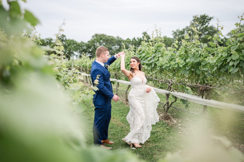 Bride and groom dance in the vineyard during their romantic wedding in Charles City, VA