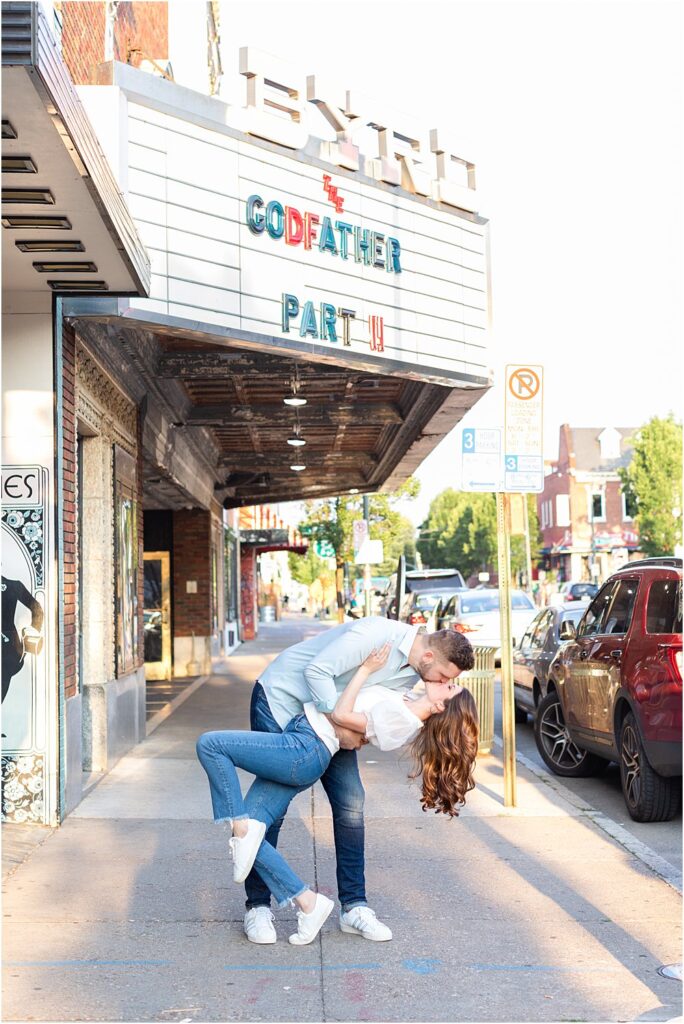 Dan dips Olivia for a spectacular movie-esque kiss beneath the Bard Theater Marquee in the Carytown District of Richmond during their effortlessly chic engagement session.