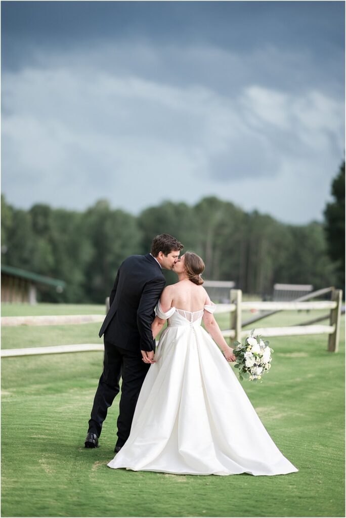 Estate at Independence bride and groom outdoors  share an intimate moment during a first look