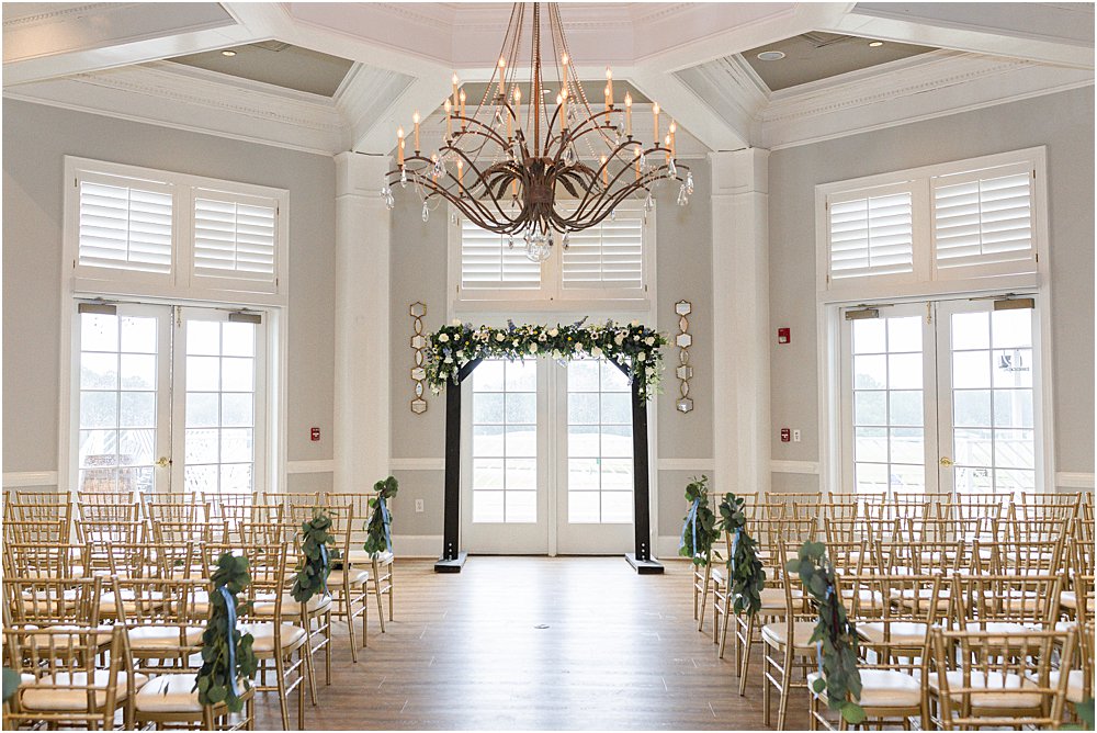 Estate at Independence ballroom with floor to ceiling windows and chandelier