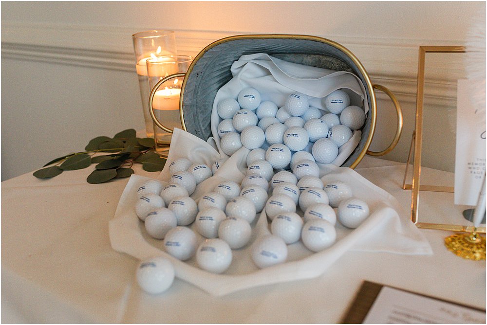 custom golf ball wedding favors in a tin bucket with gold trim