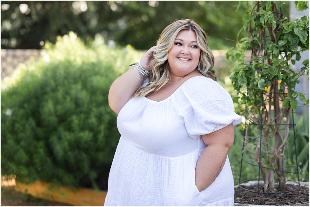 Kelsea Dayberry from Radiant Reflection posing outdoors in a personal branding photography session.