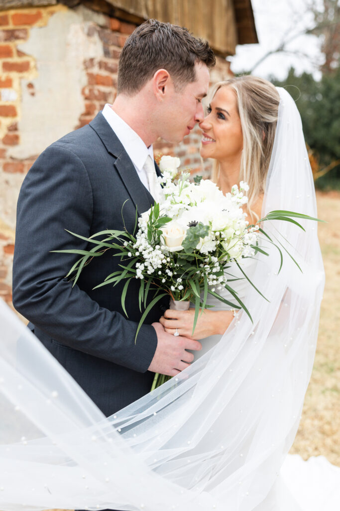 a wedding couple enjoying an intimate moment together during a first look