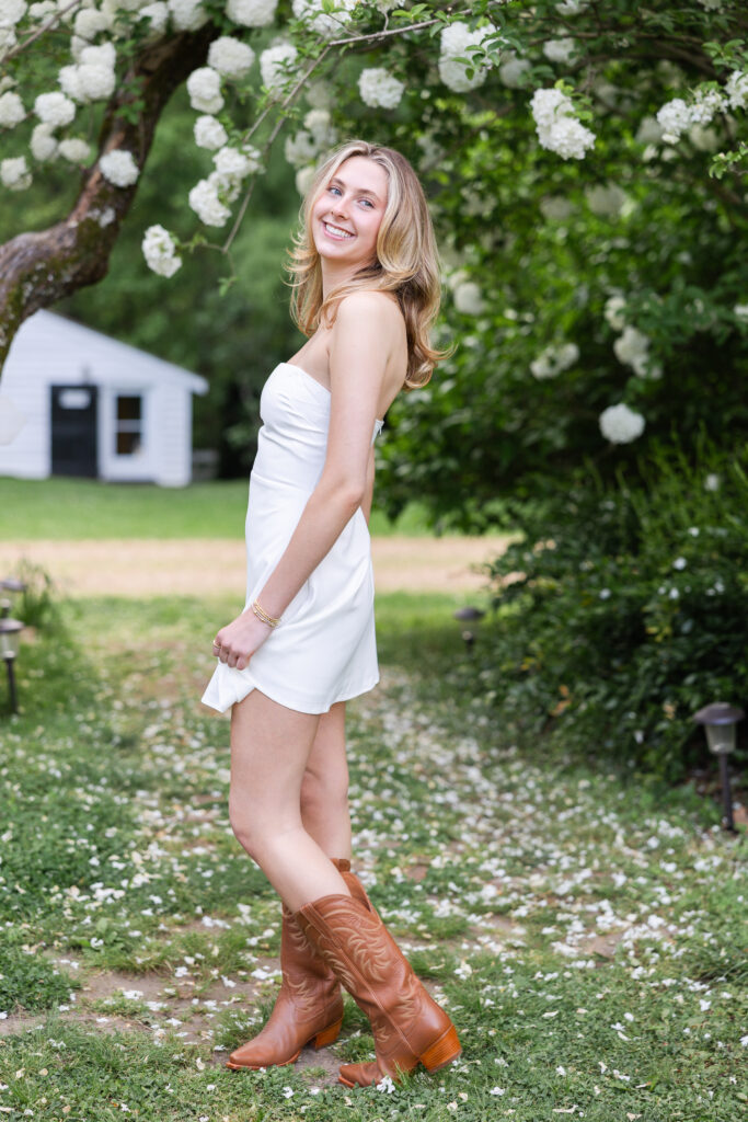 Nora wearing a white dress at Historic Tuckahoe for her Senior Portrait Session 